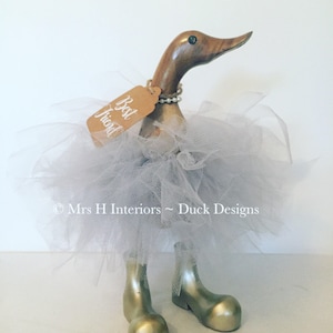 Totally lush tutu  wearing wooden duckling.... everyone needs one of these!