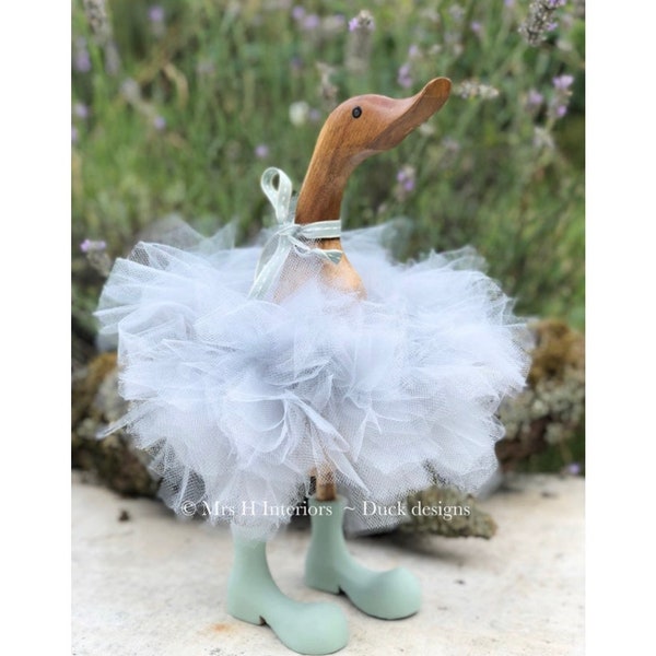 Beautiful, full dove grey tutu with duck egg boots wooden duck.