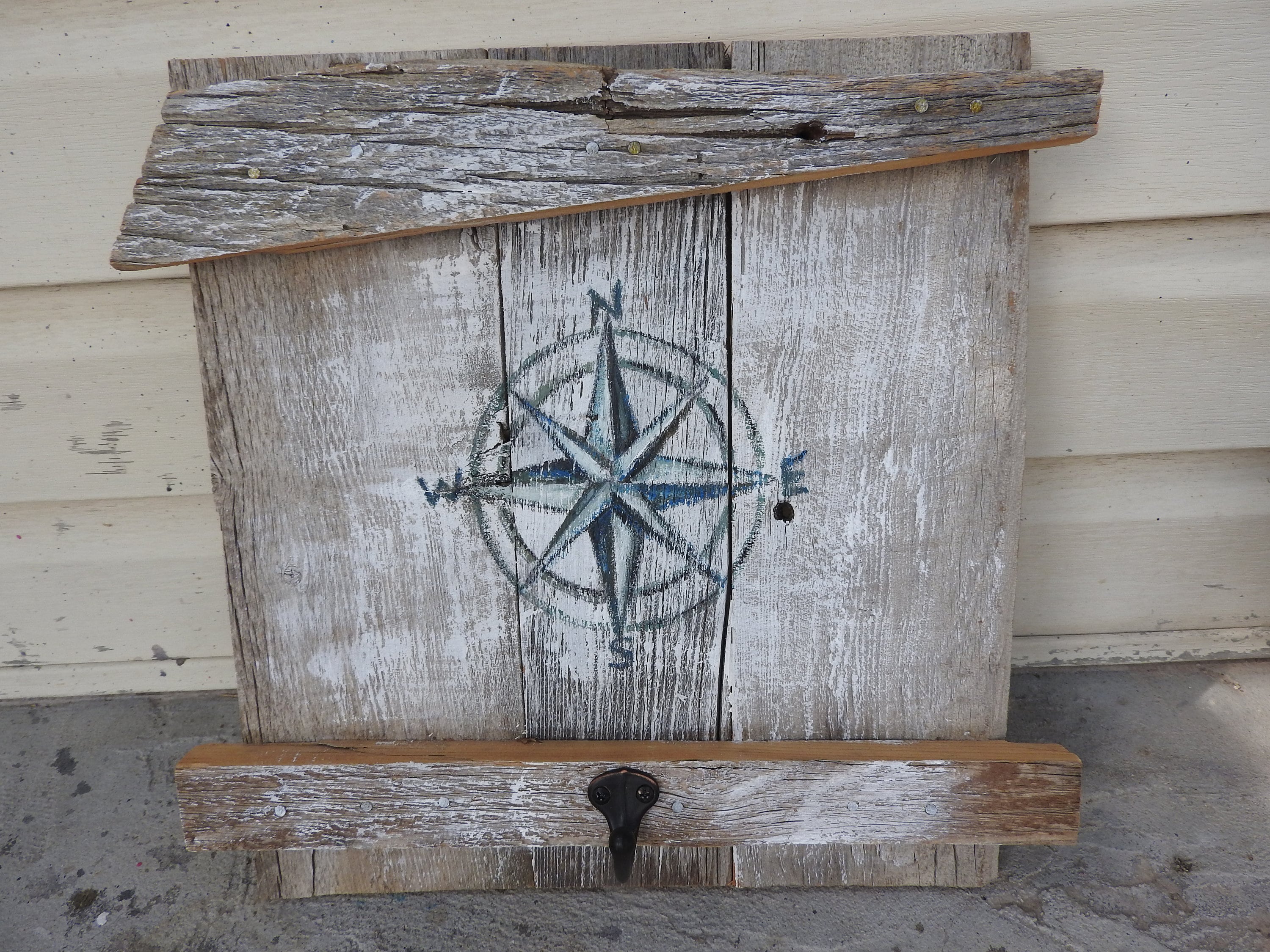 wooden shutter, coat hanger, compass ocan decor