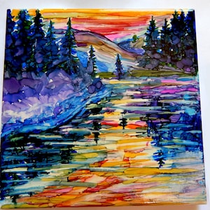 May include: Abstract painting of a landscape with a river, trees, and a colourful sunset. The painting is done in shades of blue, purple, pink, yellow, and orange.