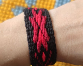 Ukrainian art. Charm bracelet made on a loom: Black and red