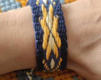 Ukrainian art. Charm bracelet made on a loom: Blue and Yellow