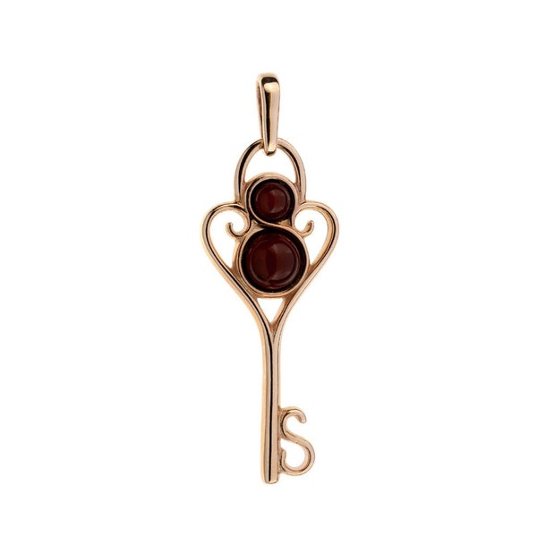 Pendentif clef ambre cerise et vermeil rose.