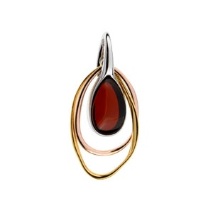 Amber pendant on rhodium-plated silver and rose vermeil.