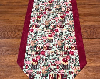 Reversible NOEL Table Runner with wine bottles