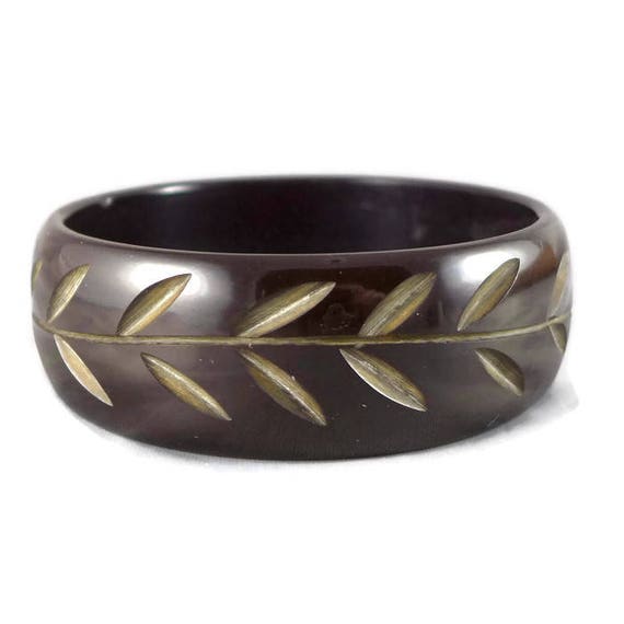 Carved bakelite bangle sale
