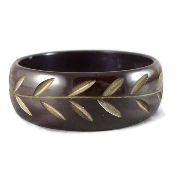 Vintage Carved Marbleized Butterscotch Bakelite Bangle Bracelet – Goodman's  Interiors & Antiques