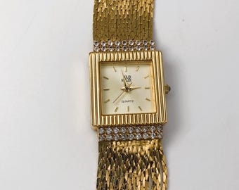 Vintage Nolan Miller Rhinestone Bracelet Watch: Gold Tone Glamour
