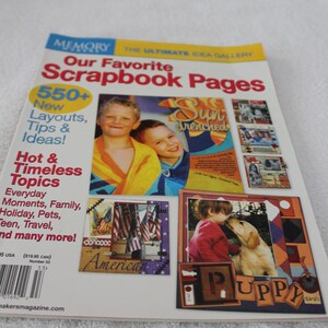 May include: A magazine titled "Our Favorite Scrapbook Pages" with images of children, flags, and a puppy. The cover features the text "550+ New Layouts, Tips & Ideas!" and "Hot & Timeless Topics".