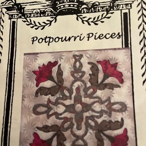 May include: A square image featuring the text "Potpourri Pieces" above a floral design. The design has a central cross-like shape with brown and red floral elements on a light background with a star pattern.