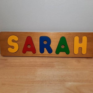 Vintage TAG Toys Wooden Colorful Sarah Name Board