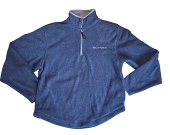 May include: A dark blue fleece pullover with a half-zip closure and the text "OLD NAVY" embroidered on the front.