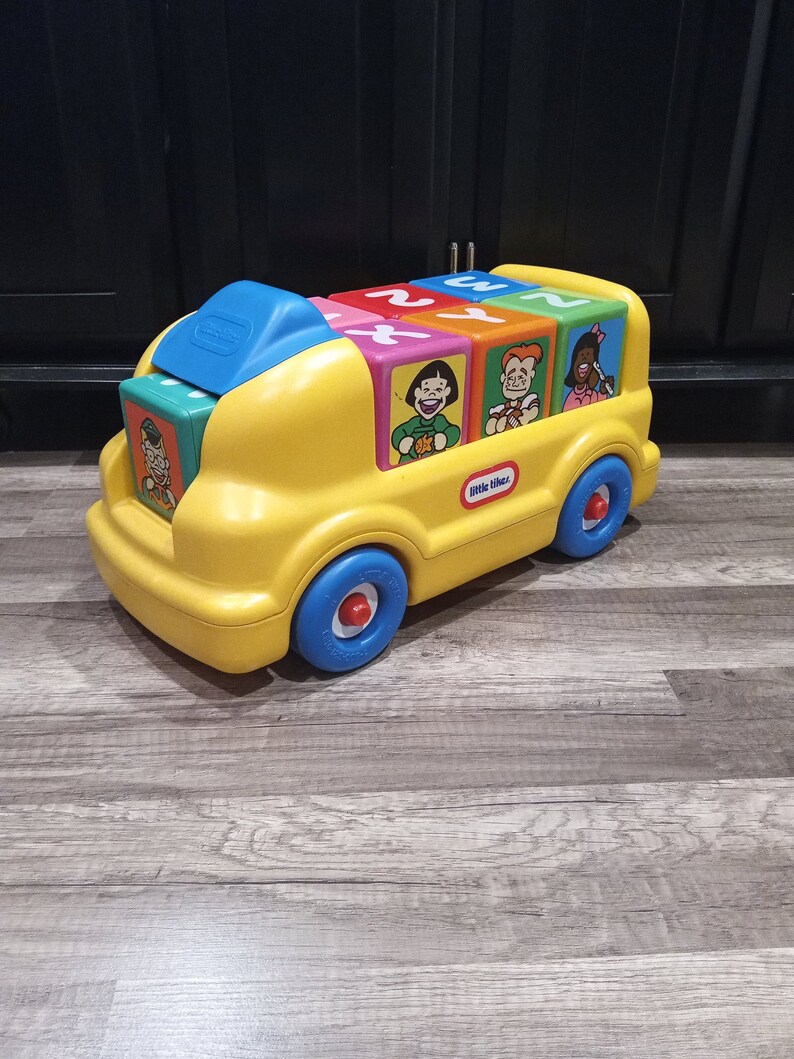 little tikes school bus ride on