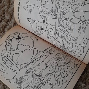 May include: Black and white coloring book page featuring Bambi, Thumper, and a bird. The page includes the text "You didn't hop far enough!"