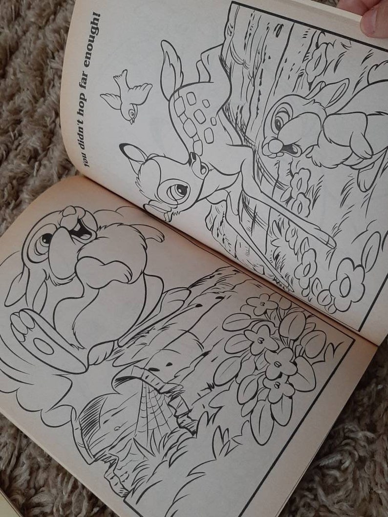 May include: Black and white coloring book page featuring Bambi, Thumper, and a bird. The page includes the text "You didn't hop far enough!"