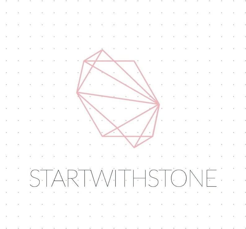 May include: A pink geometric shape with a white background and the text "STARTWITHSTONE" below.