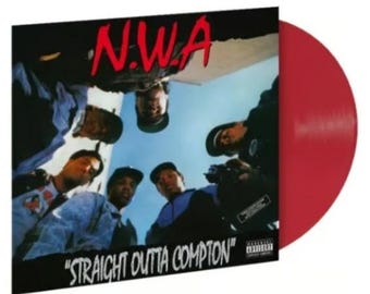 May include: A red vinyl record with a black and white album cover featuring a group of men in a circle with the text "N.W.A" and "Straight Outta Compton" on the cover.