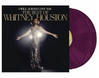 May include: A double vinyl record set featuring Whitney Houston. The cover art features a photo of Whitney Houston in a sequined dress with the title "I Will Always Love You: The Best of Whitney Houston".