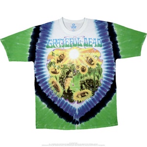 May include: A tie-dye t-shirt featuring a colorful image of sunflowers and a turtle with the text "Grateful Dead" in a green, blue, and white color scheme.