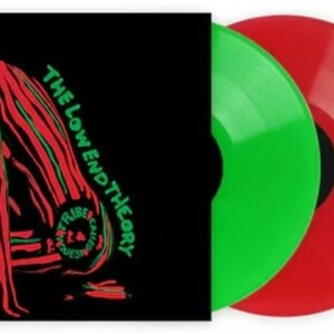 May include: A black vinyl record with a green and red swirl design. The record is titled "The Low End Theory" by A Tribe Called Quest.