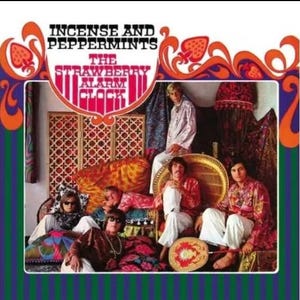 May include: A vintage album cover featuring a band called "The Strawberry Alarm Clock" with the title "Incense and Peppermints". The band members are dressed in colorful clothing and are sitting on a couch in a room decorated with a psychedelic pattern.