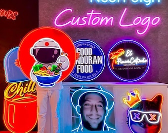 May include: A collection of neon signs, including a "Neon Sign Custom Logo" sign in blue and pink. Other signs feature a cartoon astronaut with ramen, a restaurant logo, and a portrait with the name "Maoricio's".