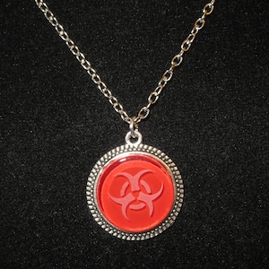 Red Biohazard Etched Glass Pendant Necklace 24 inch