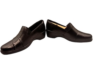 Zapatos mocasines de cuña sin cordones Clarks May Marigold de piel negra para mujer, talla 9 M, 26062909