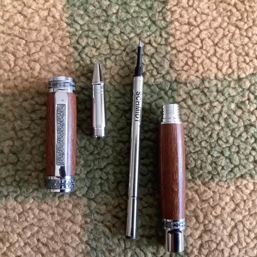 Jr Emperor Rollerball Pen shops - Rhodium & Black TiTanium. Body is leapordwood.