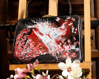 Hand-painted black vintage leather bag with a crane