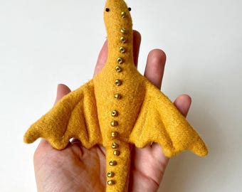 Golden Pocket Dragon Plushie: Customizable Weighted Companion, minimalist design