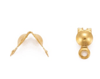 May include: Two gold-tone metal jewelry clasps. One clasp is a round ball with a loop. The other clasp is a V-shaped piece with two loops.