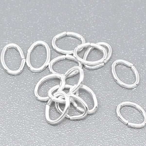 100 anneaux ouverts ovales - 5,5 mm x 4 mm - Connecteurs plaqués argent - J10861A