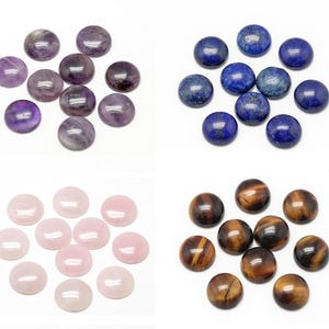 May include: A collection of polished gemstone cabochons in various colours. Includes amethyst, lapis lazuli, rose quartz, and tiger's eye. Each stone is round with a smooth, glossy finish. Suitable for jewellery making or crafts.