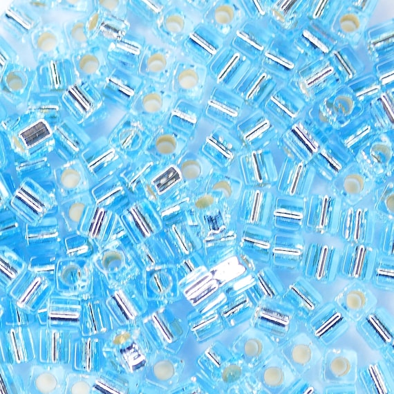 Silver Lined Aqua - 1.8mm Cube, Miyuki 8.2g Silver Lined Aqua - 1.8mm Cube, Miyuki 8.2g