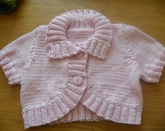 Hand Knitted Pale Pink short sleeved cardigan to fit 3-6m