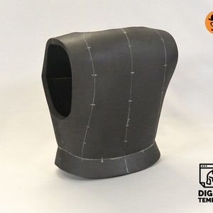 May include: A black foam vest with white lines drawn on it. The vest is designed for sewing and has a neck opening.