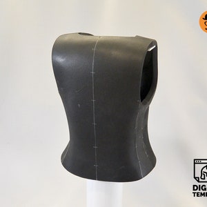 May include: A black foam dress form with markings for sewing, used for creating custom clothing patterns.