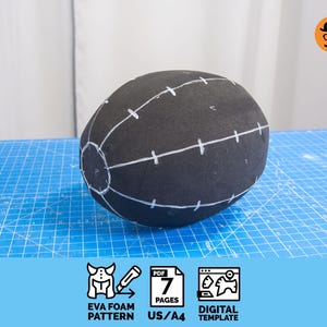 Puede incluir: Un patrón de espuma EVA esférico negro con marcas blancas, sobre una superficie de cuadrícula azul. La imagen incluye iconos y texto: "EVA FOAM PATTERN", "7 PAGES" y "DIGITAL TEMPLATE".
