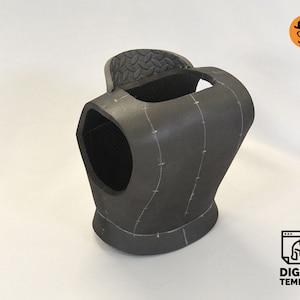 May include: A gray foam armor chest piece with stitching and markings. The armor is designed for cosplay or costume making.