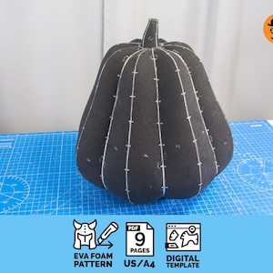 May include: A large, black pumpkin made from EVA foam, with white stitching details. The pumpkin is on a blue cutting mat. The image includes text that says "EVA FOAM PATTERN", "9 PAGES", and "DIGITAL TEMPLATE".