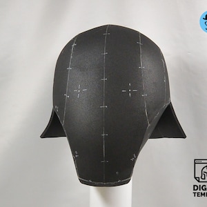 May include: Black foam helmet with white markings, a digital template for crafting a costume.