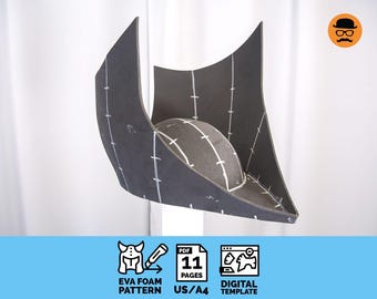 May include: A dark gray EVA foam pattern for a tricorn hat, with white markings. The hat is displayed against a white background. The image includes text that reads "EVA FOAM PATTERN", "11 PAGES", and "DIGITAL TEMPLATE".