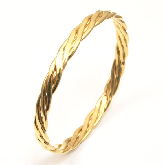 Solid gold hotsell slave bangle