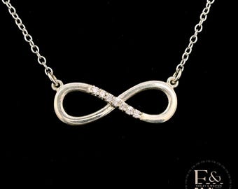 Colgante infinito de moissanita en plata de ley