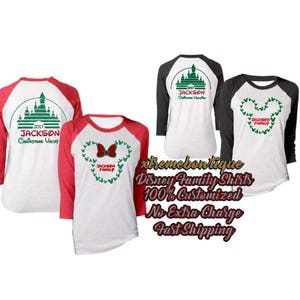 May include: A set of four baseball-style shirts with a Christmas vacation theme. The shirts are white with red sleeves and feature a green and white image of Cinderella's castle with the text "2017 Jackson Christmas Vacation". The other shirts feature a green and white image of Mickey Mouse ears with the text "Jackson Family".