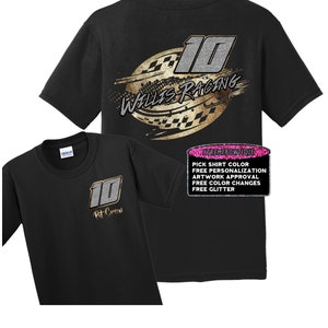 May include: Black t-shirt with a gold and silver design featuring the number 10 and the text "Wallis Racing". The back of the shirt has the design, and the front of the shirt has the number 10 and the text "Pit Crew".