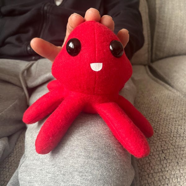 Peluche de calamar hecho a mano con patas con peso