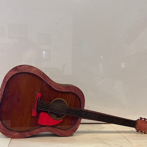 Guitar piggy bank