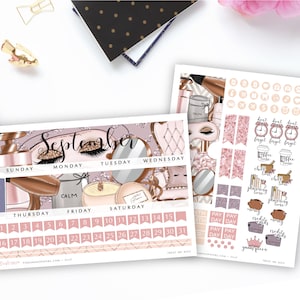 May include: Two sheets of planner stickers with a beauty theme. One sheet features a calendar for September, with illustrations of perfume, mirrors, and eyelashes. The other sheet includes icons, flags, and text like "coffee time."